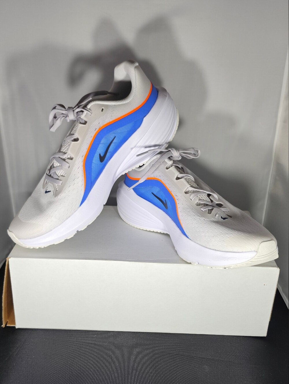 Nike Men’s White Running Shoes with Blue & Orange Accents